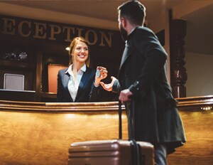 receptionist handing keys