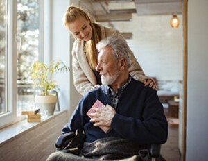 woman with man on wheelchair