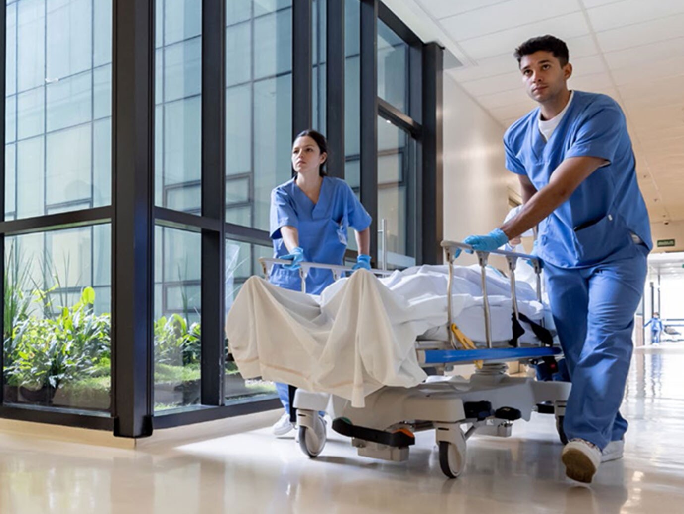 nurses rushing with patient