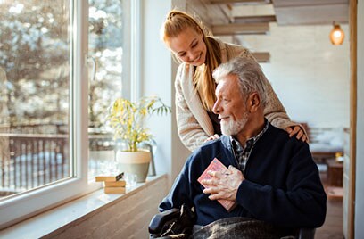 woman with man on wheelchair