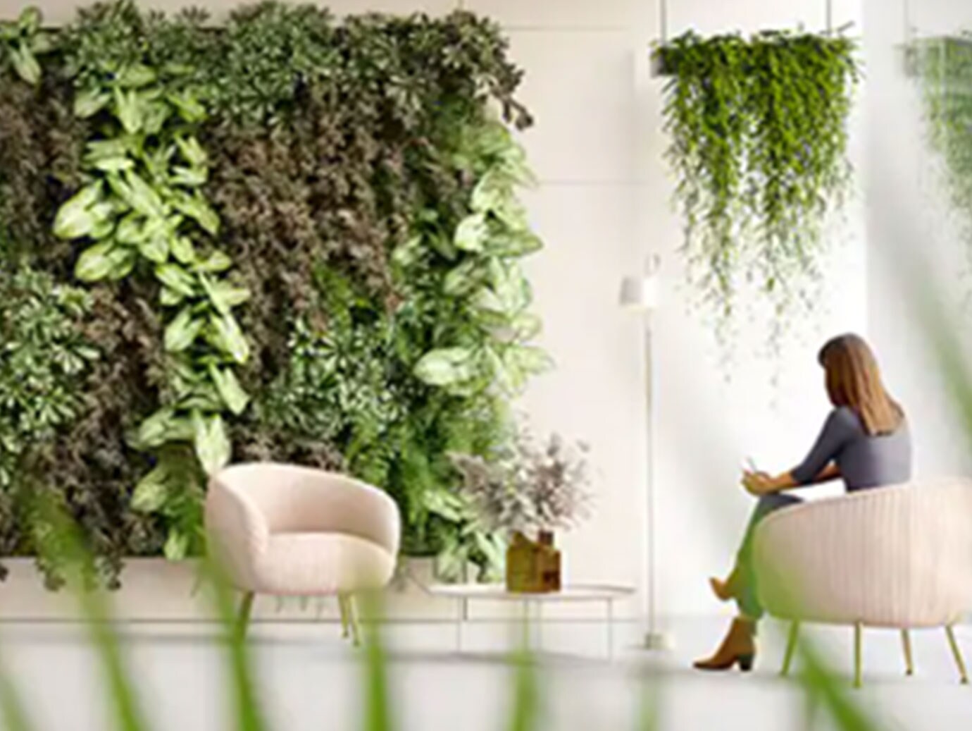 woman in room with plants