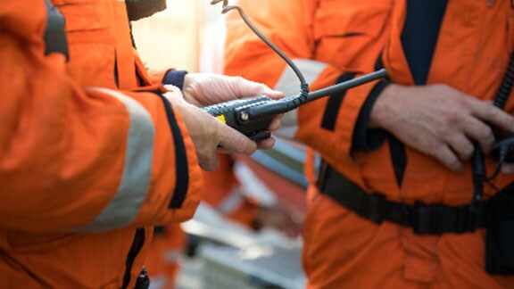technicians with monitoring devices