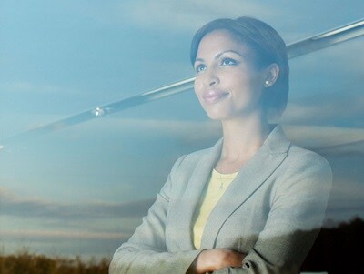 businesswoman gazing out a window