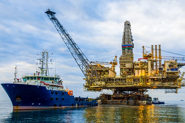boat with offshore oil rig