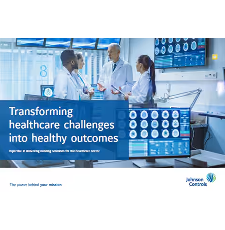 A group of doctors engaged in discussion, with a blue poster advertising healthcare services in the foreground