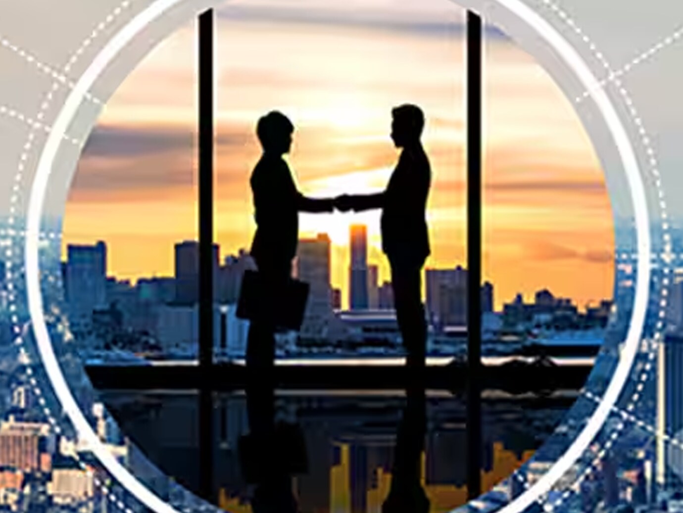 Aerial view of a city skyline, overlaid with an image of two businessman shaking hands against a sunset