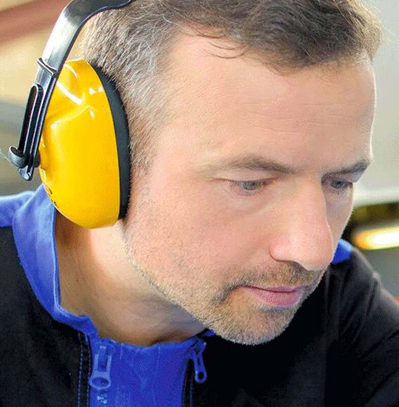 Close up of a man wearing headphones