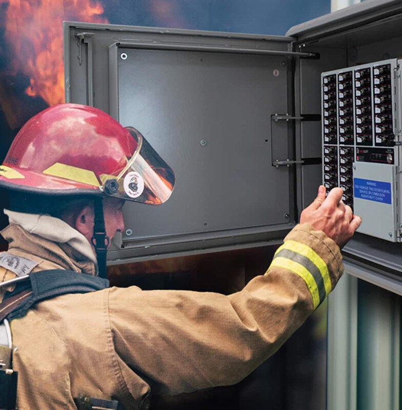 Fire fighter operating a control panel during an emergency