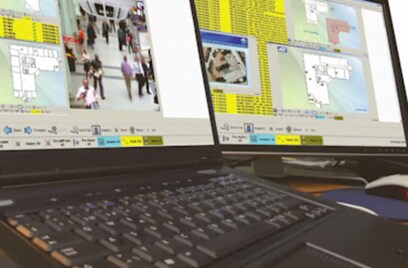 Two computer screens displaying fire detection networks