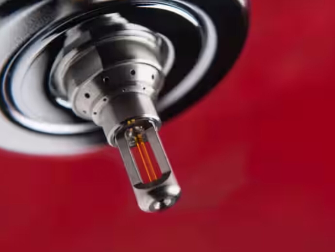 Fire sprinkler equipment against a red background
