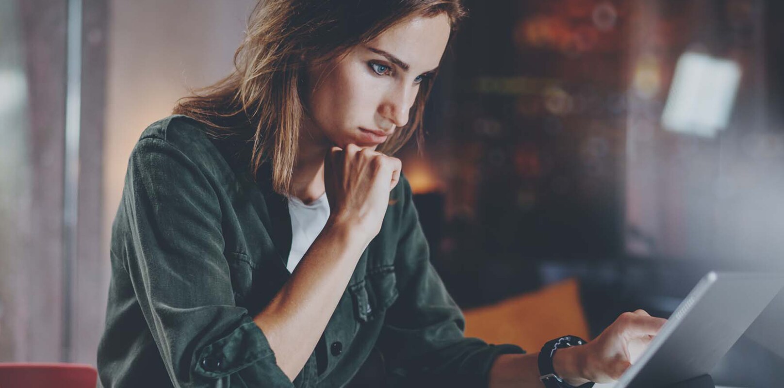 woman looking at laptop
