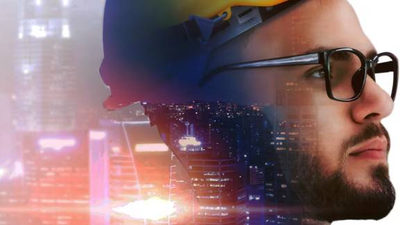 Close up of man wearing safety.