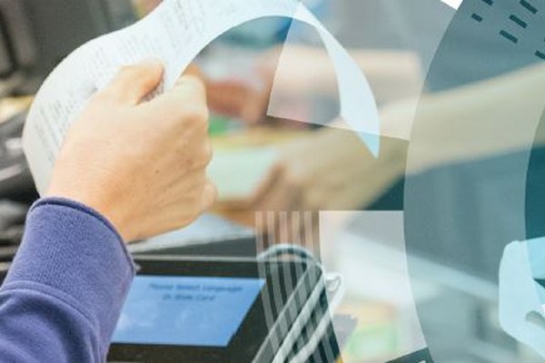 A person's hand holding a receipt and circular graphics on the side