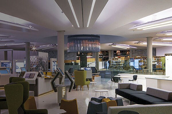 Interior of a modern room with chairs and tables