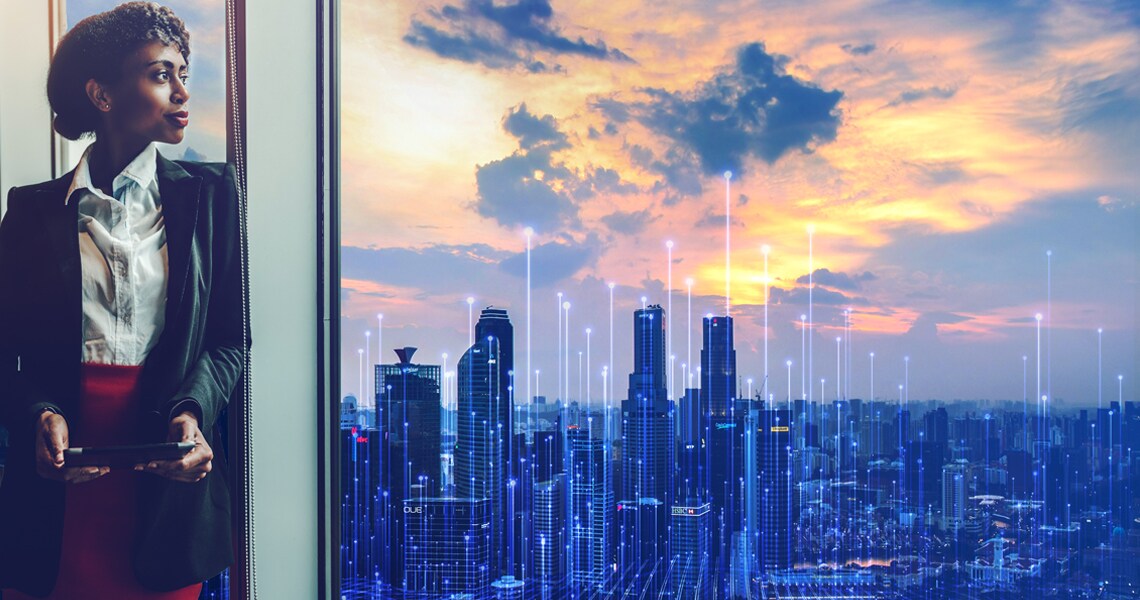 Woman looking through a glass window at the city overlaid with graphic depicting technology