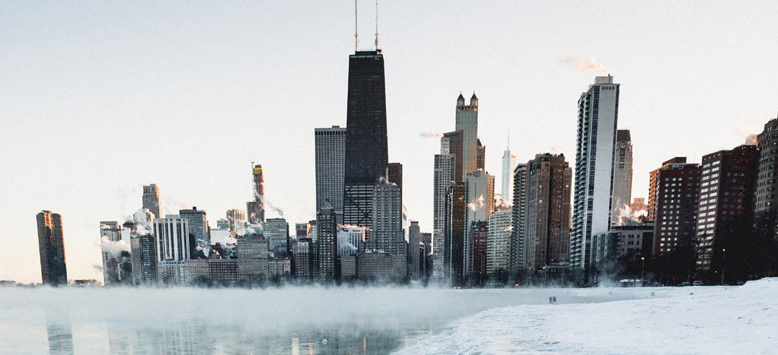 Chicago skyline over Lake Michigan on a foggy morning