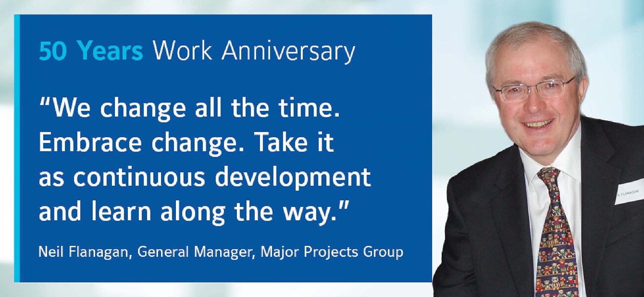 Neil Flanagan, GM of Major Projects Group, smiling with a quote by him