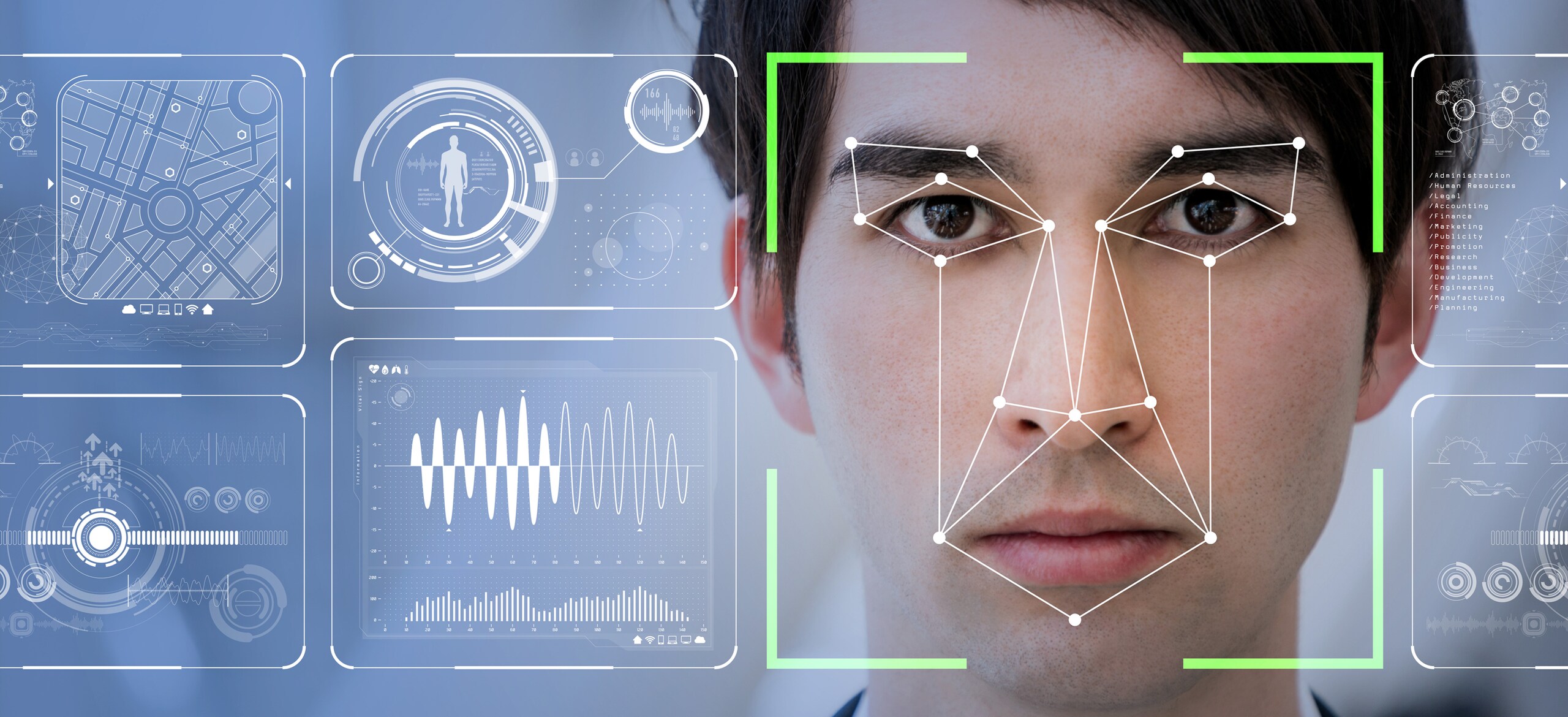 Portrait of a man with facial recognition graphics over his face