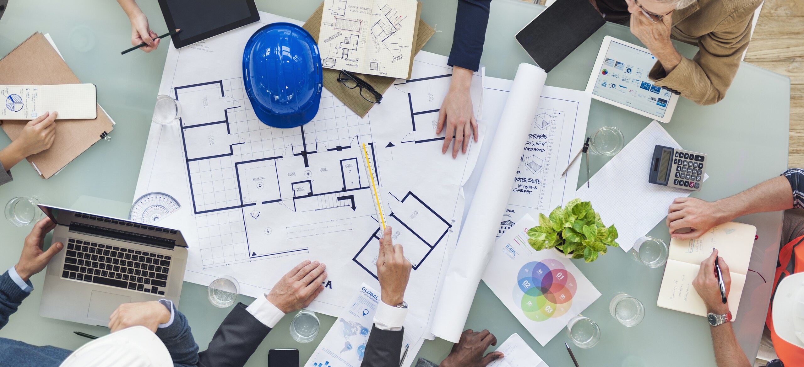 Top view of people having a discussion in a meeting room