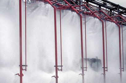 A row of fire sprinkler systems at work