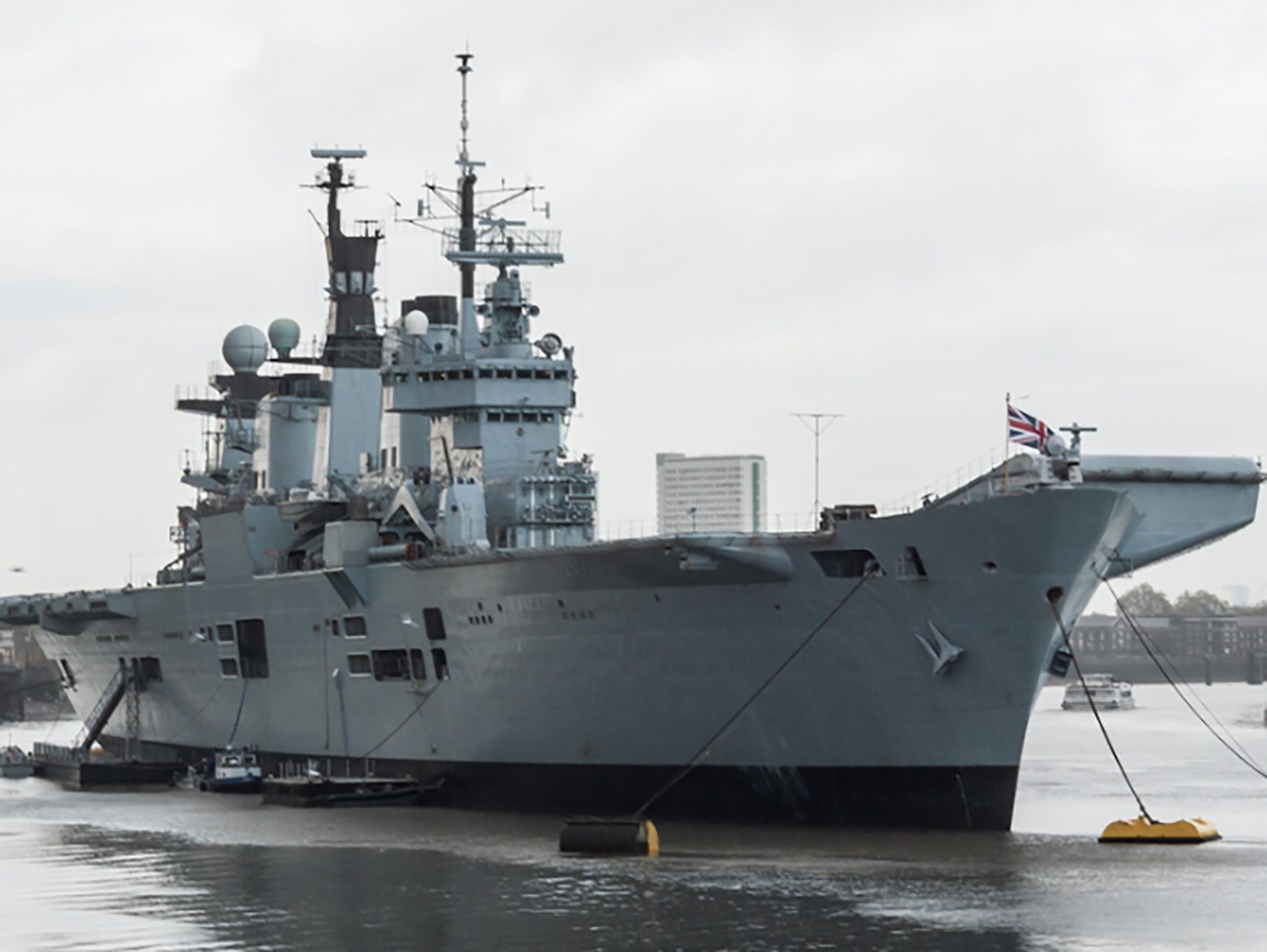 Warship anchored near the shore