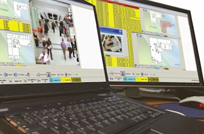 Two laptop screens depicting network solutions