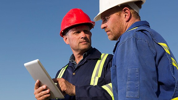 Supervisors and safety observers discussing