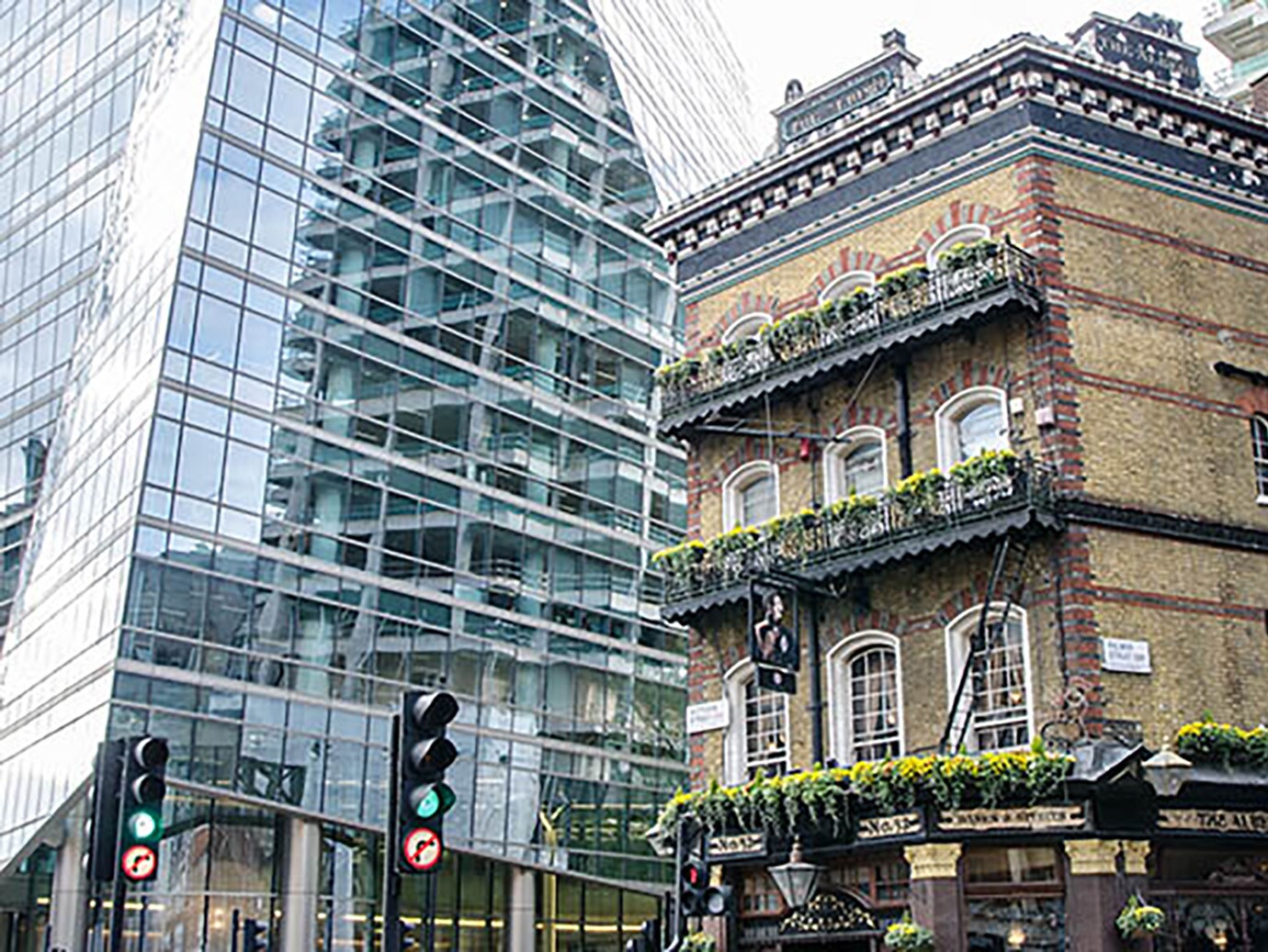 Street in front of old and modern buildings in London