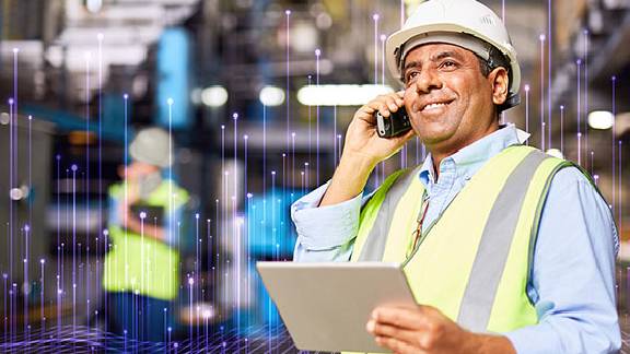 contractor safety gear speaking phone