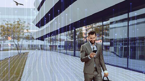 man carrying messenger bag walking