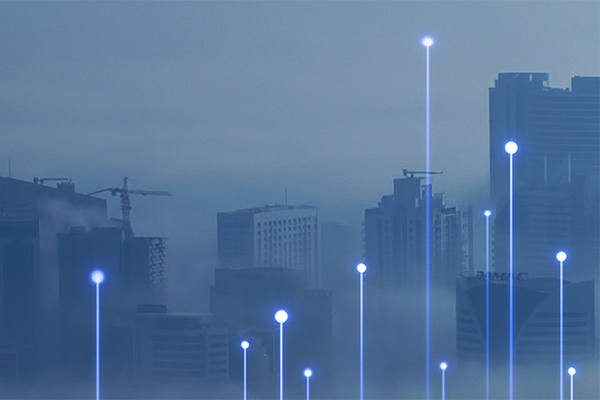 buildings and skyscrapers against fog