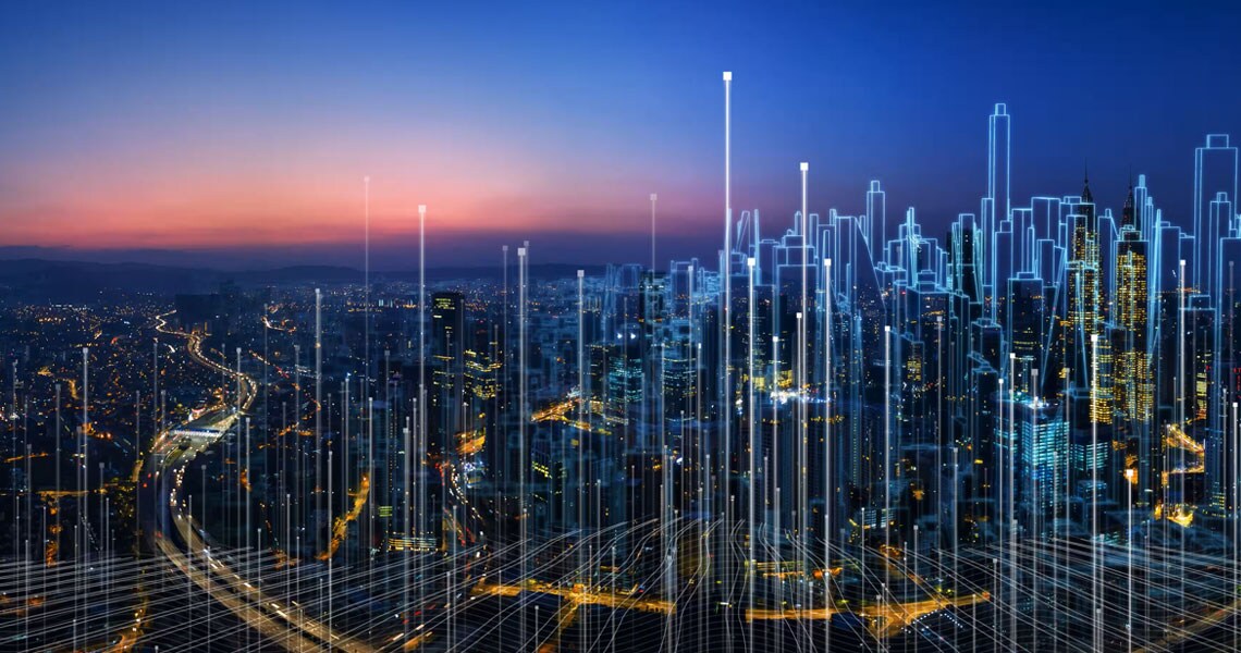 A holographic display of tall buildings on top of a cityscape
