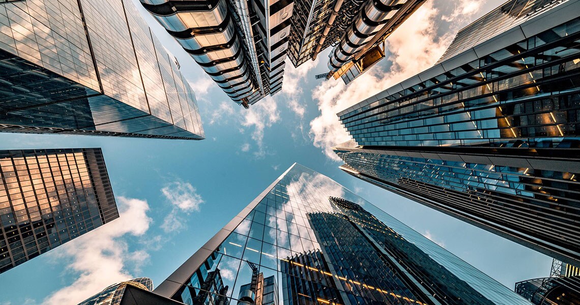 An upward shot of skyscrapers during day time