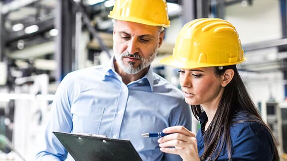 Workers Looking Tablet Yellow Helmet