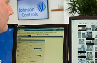 security officer watching surveillance footage