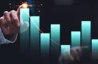 Close-up of a businessman pointing at a holographic bar graph