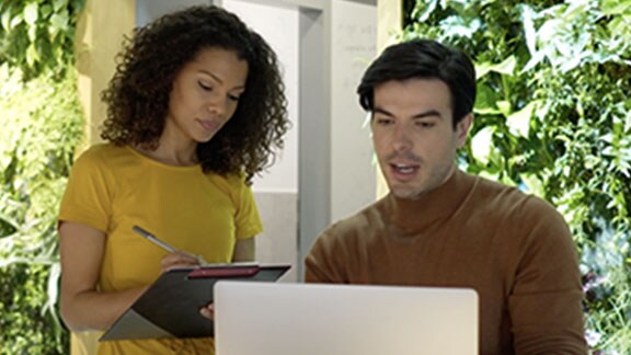 Young couple using  laptop