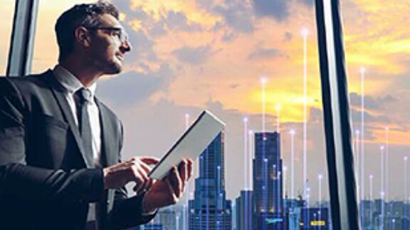 businessman near window in office 