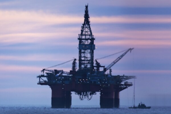 An oil rig during dusk