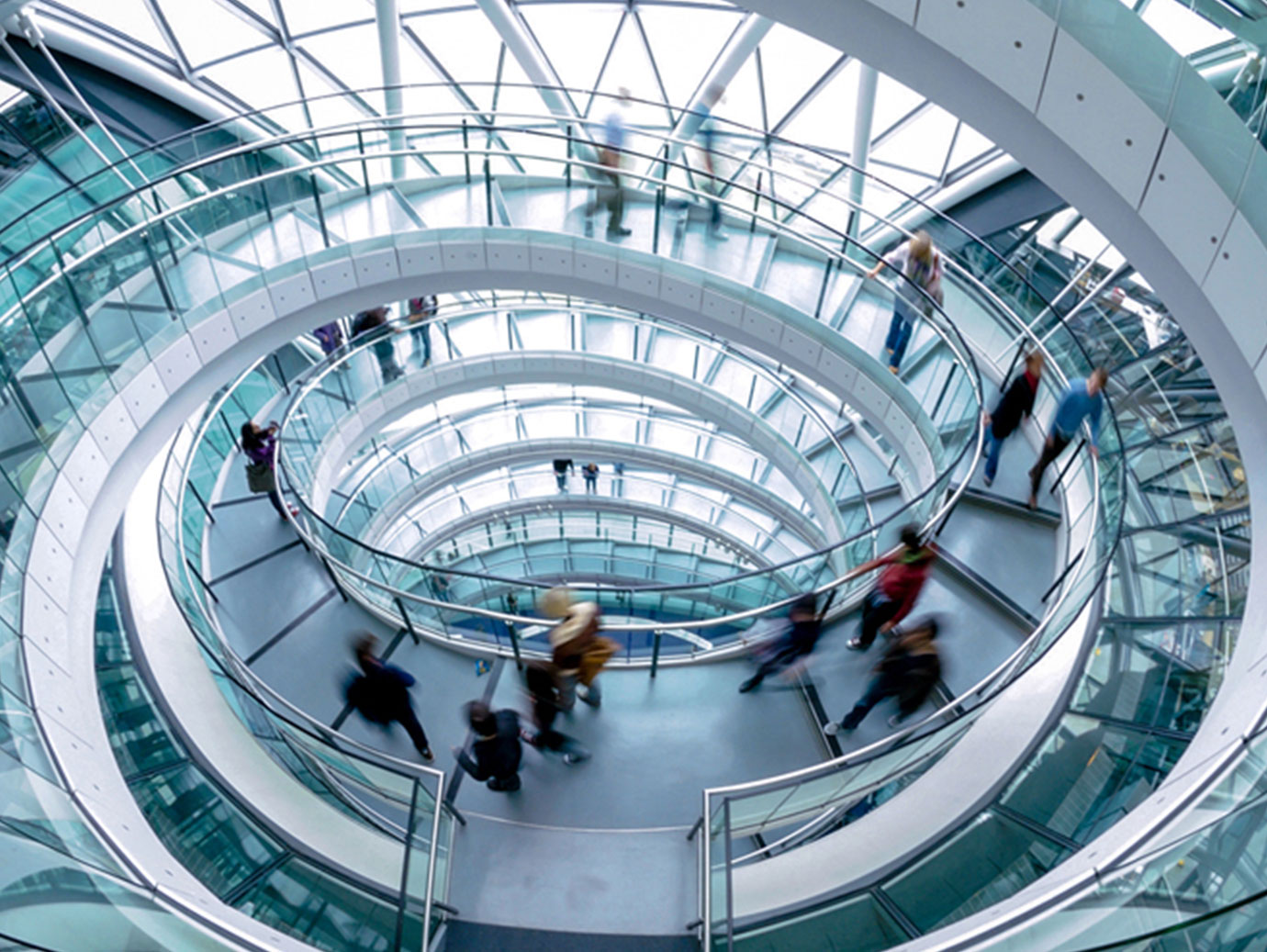 circular staircase with glass railings