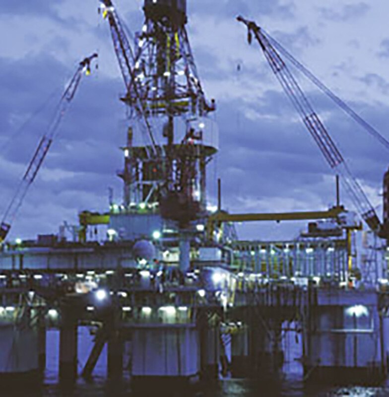 An offshore oil rig at twilight